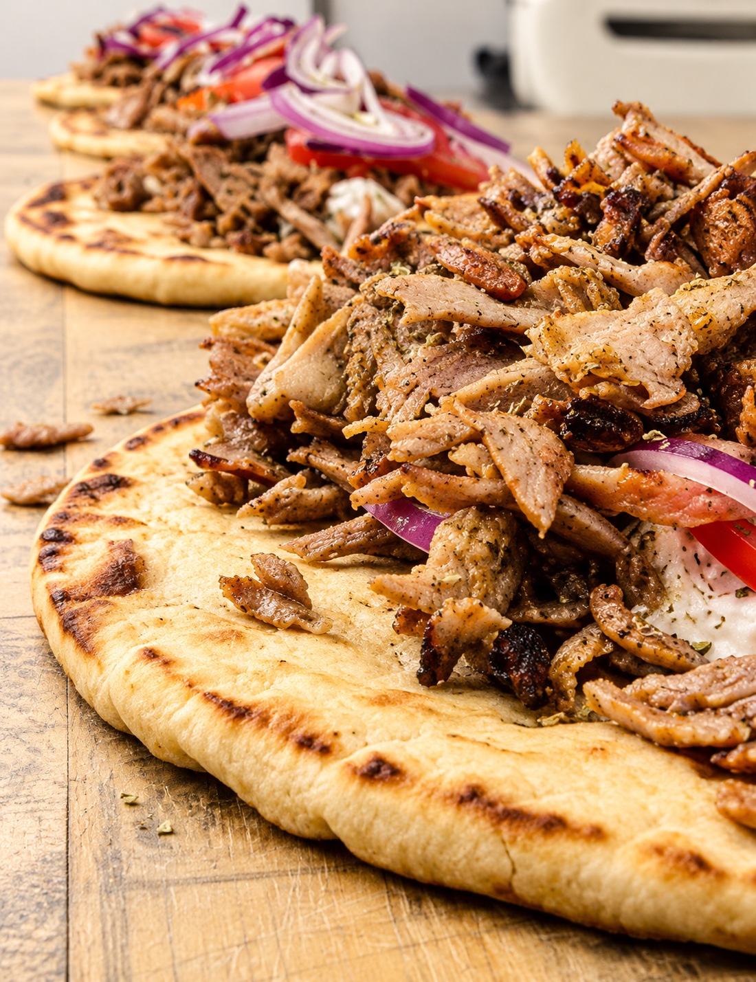 Gyros au porc mariné sur pain pita